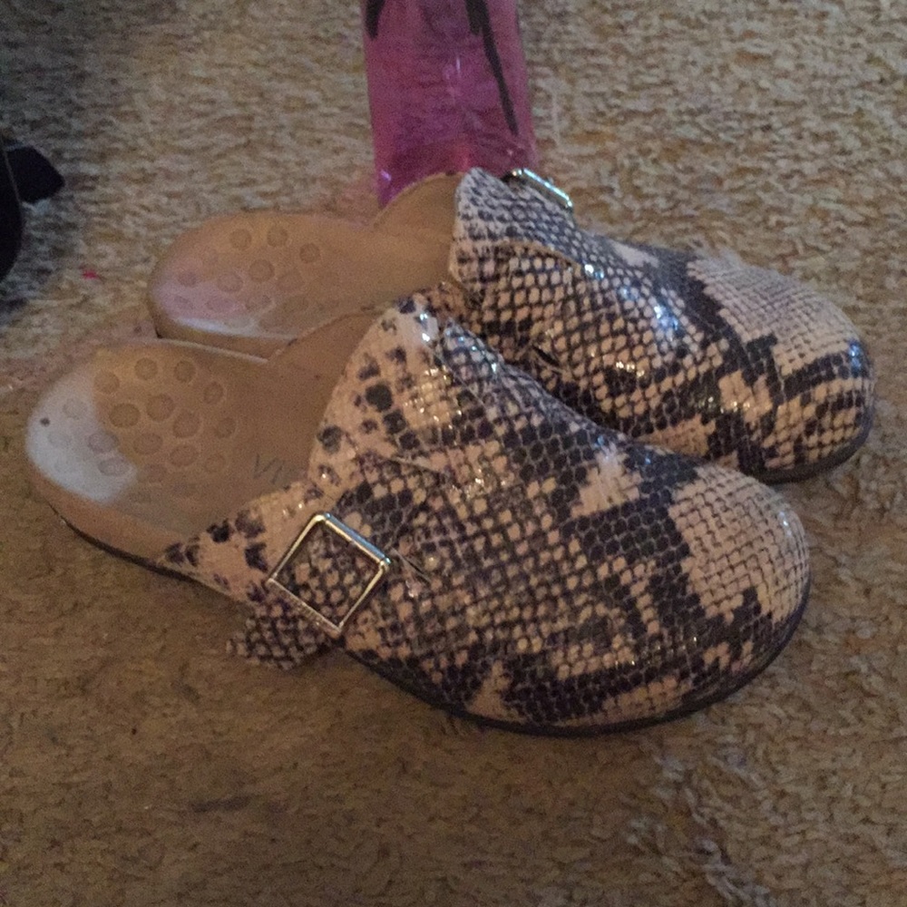 snakeskin print clogs